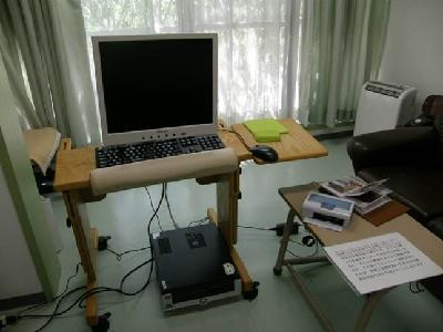 車椅子から花を楽しめるラティス 撮った写真を見てその場でプリント