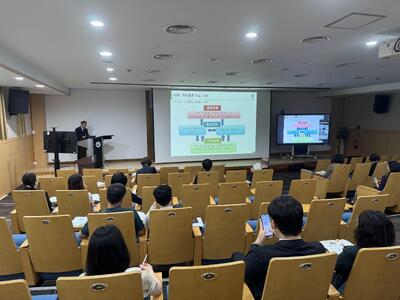 (写真)杉林主任研究員による発表の様子